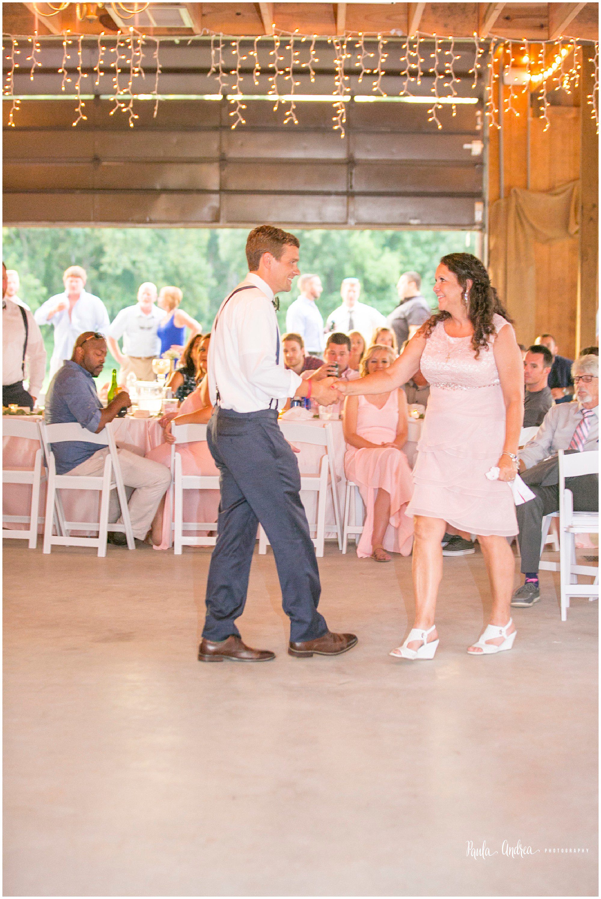 greensboro,nc barn wedding, neon wedding exit, greensboro,nc barn reception, groom and mom first dance, groom dance, greensboro nc wedding, greensboro wedding photographer