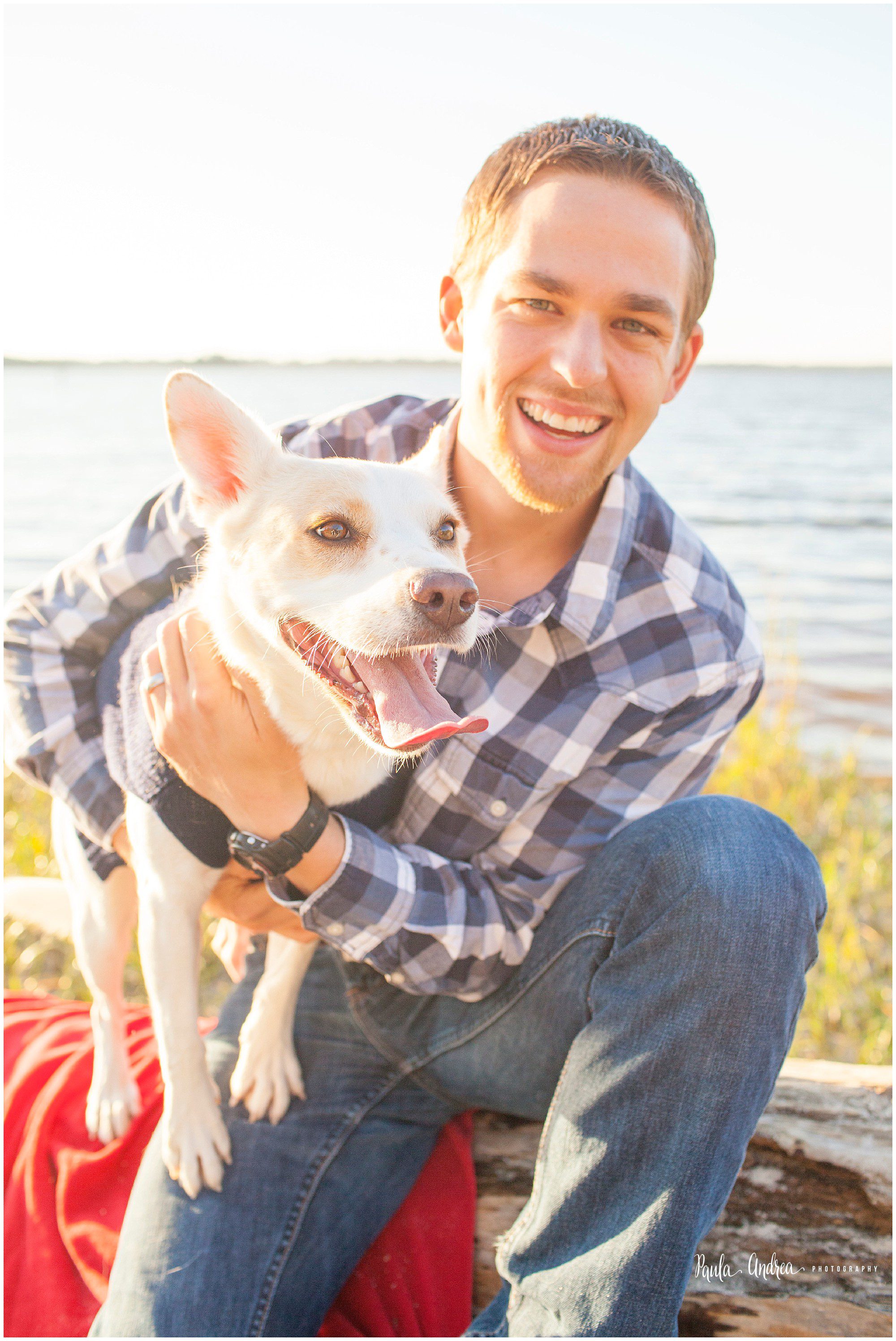 dog with owner portraits at the beach in wilmington,nc