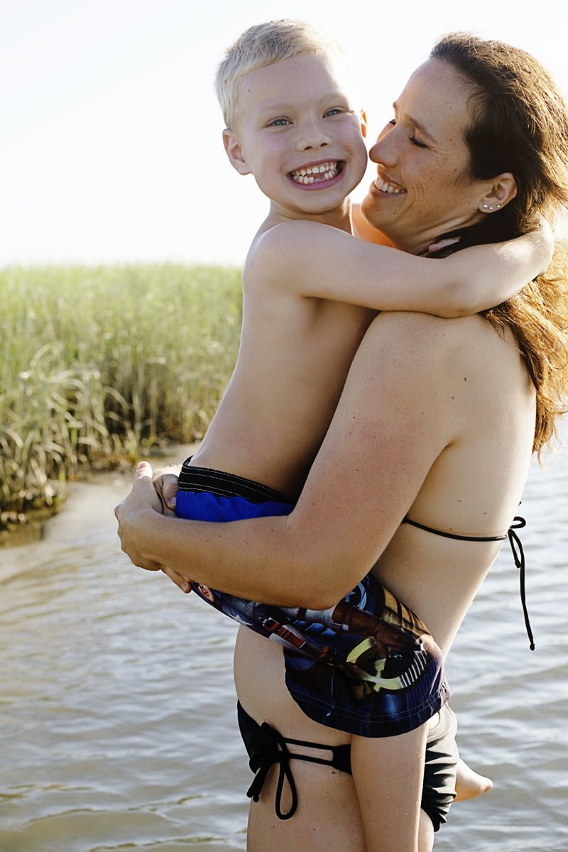 mom with son in water