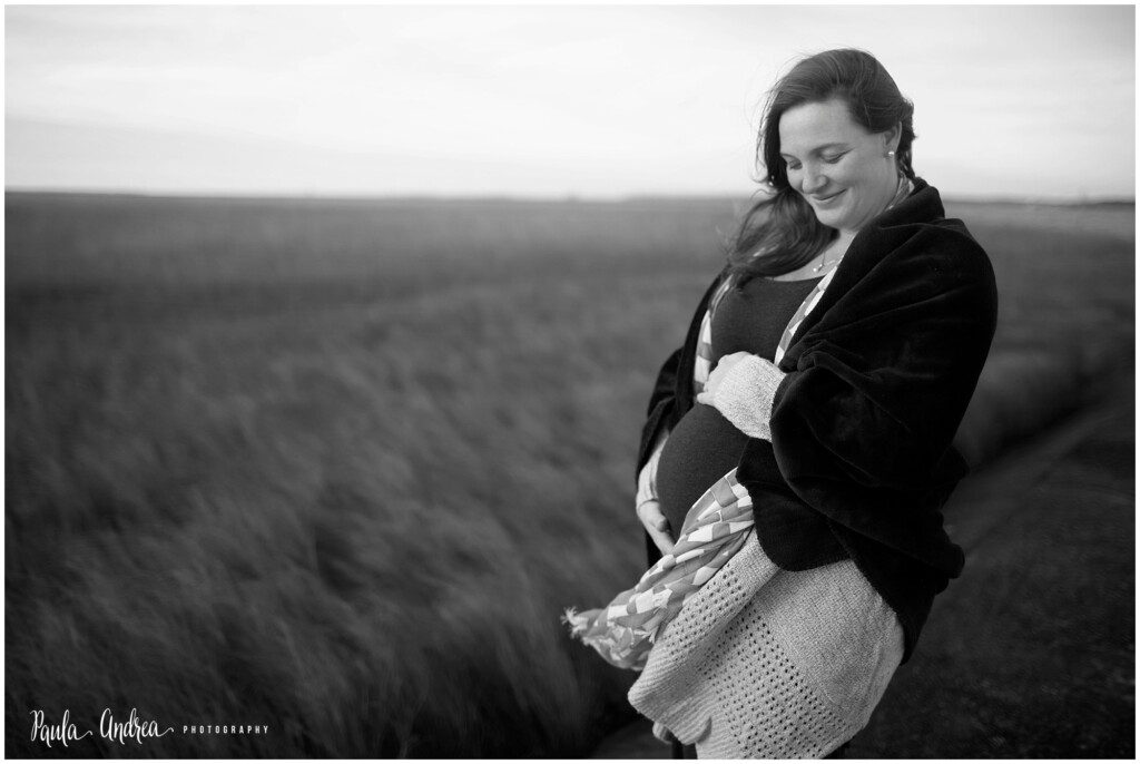 winter maternity photo shoot with a coat and scarves in wilmington,nc 